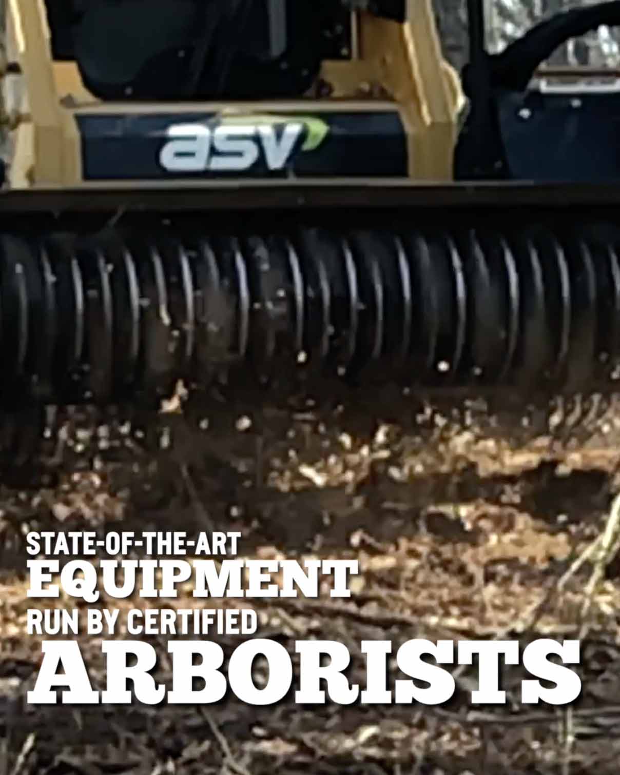 closeup of forestry mulching machine doing land clearing