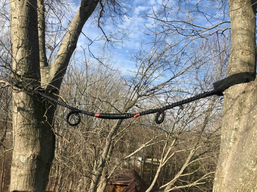 Tree cabling system installed between trees for structural support